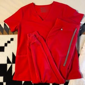 Red FIGS scrubs, two pocket top with Zamora jogger. Small.